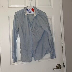 Light blue fitted, button up blouse
